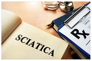 Medical clip board and open book saying sciatica